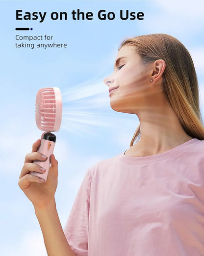 Portable Rechargeable USB Hand Fan with LED Display - lifestyle use on the go